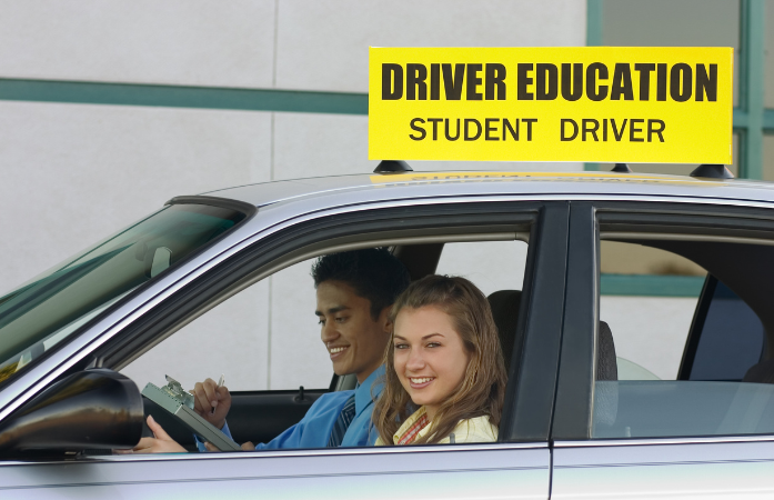  driver training in a car instructor and student